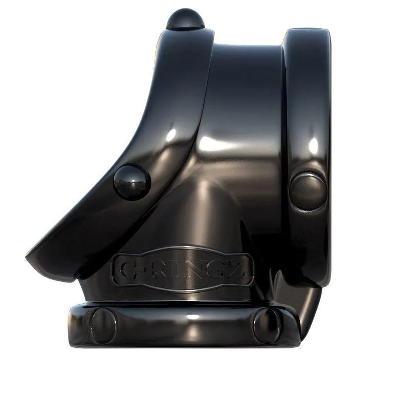 Cockring extensible noir en TPR, design ergonomique pour érections durables, avec surface lisse et boutons décoratifs.