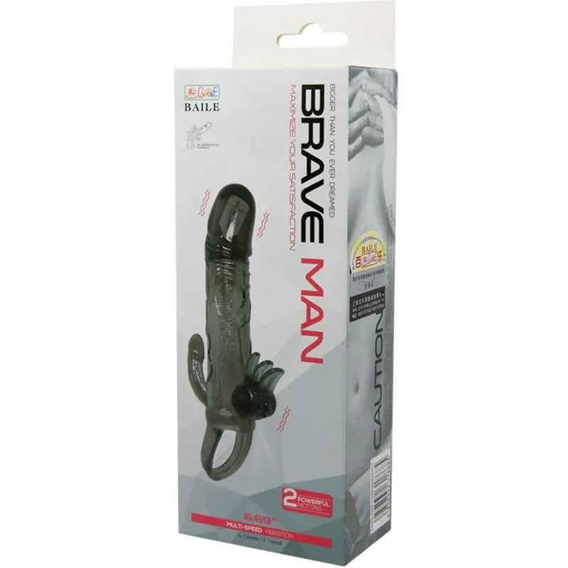 Cockring vibrant noir avec stimulateur anal intégré, texture réaliste, emballage blanc avec détails rouges et noirs.