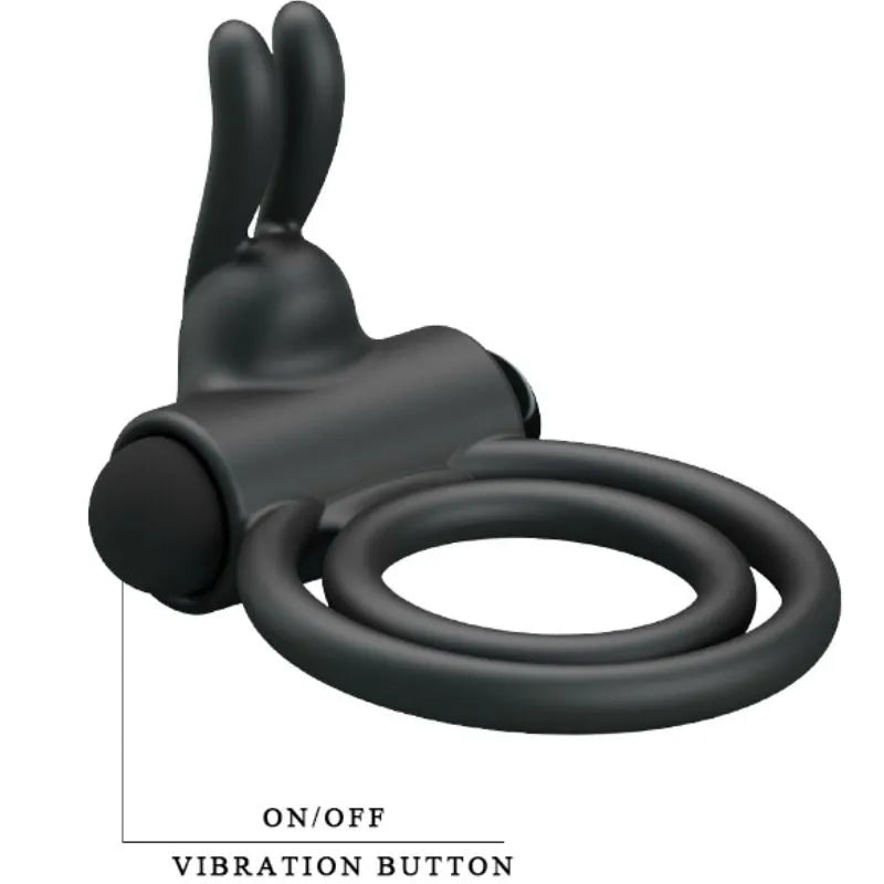 Cockring vibrant en silicone noir, double anneau avec balle vibrante, forme ergonomique pour stimulation intense et confort.
