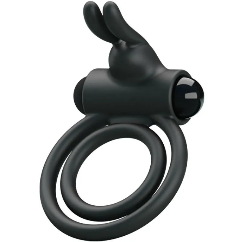 Cockring vibrant en silicone noir avec double anneau et balle vibrante, conçu pour érections durables et stimulation clito...
