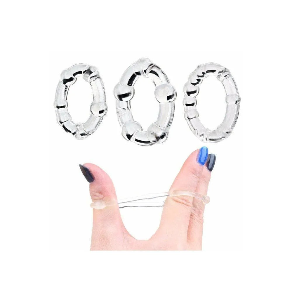 Cockrings transparents avec billes, extensibles, en TPR sans phtalate, pour érections prolongées et stimulation accrue.