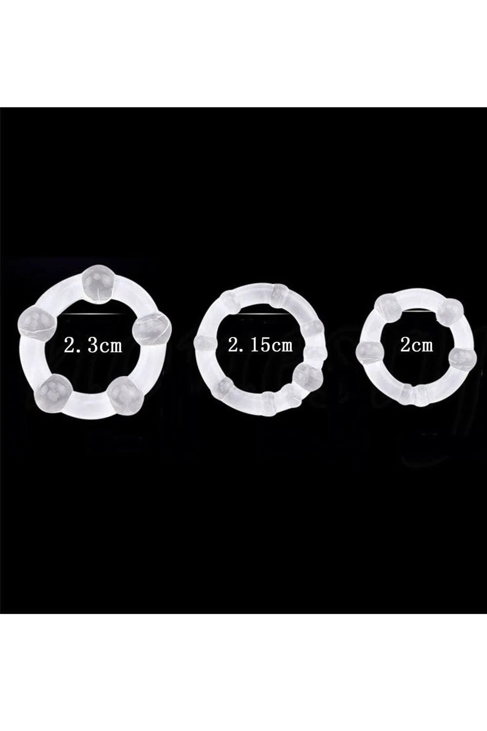 Cockrings transparents avec billes, diamètres 2.3cm, 2.15cm, 2cm, en TPR extensible pour érections prolongées.