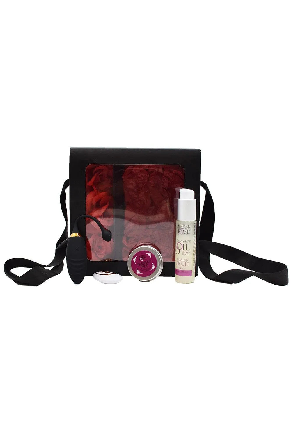 Coffret Noël pour couple avec huile et bougie massage fruit de la passion, boîte noire, produits intimes visibles.