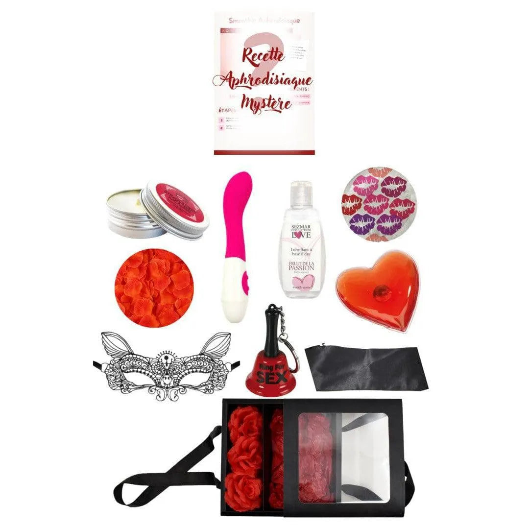 Coffret Coquin Édition Limitée, 11 accessoires intimes, rose et noir, masque, jouet rose, huiles et pétales rouges.
