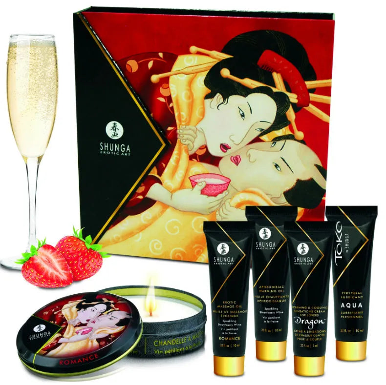 Coffret Shunga Fraises Cava avec huiles, bougie, fraises et flûte de cava, design élégant et sensuel.