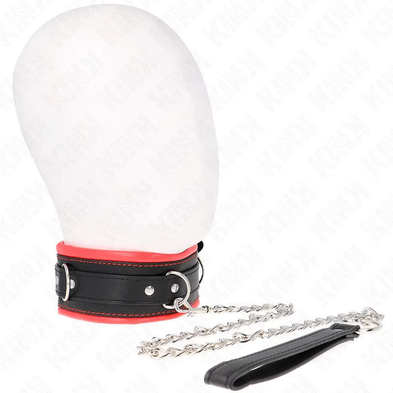 Collier BDSM cuir noir et rouge avec chaîne, design élégant et sophistiqué, pour jeux BDSM raffinés.
