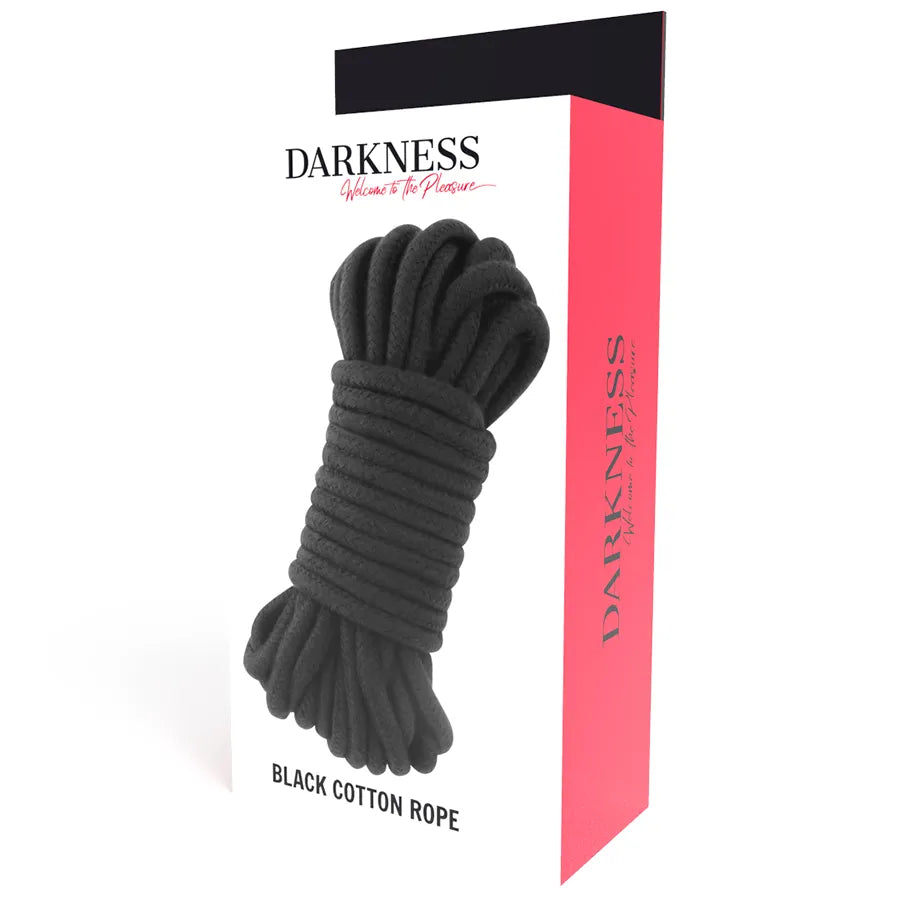 Corde bondage coton noir 10m enroulée, douce et robuste, idéale pour jeux BDSM, présentée dans un emballage élégant.
