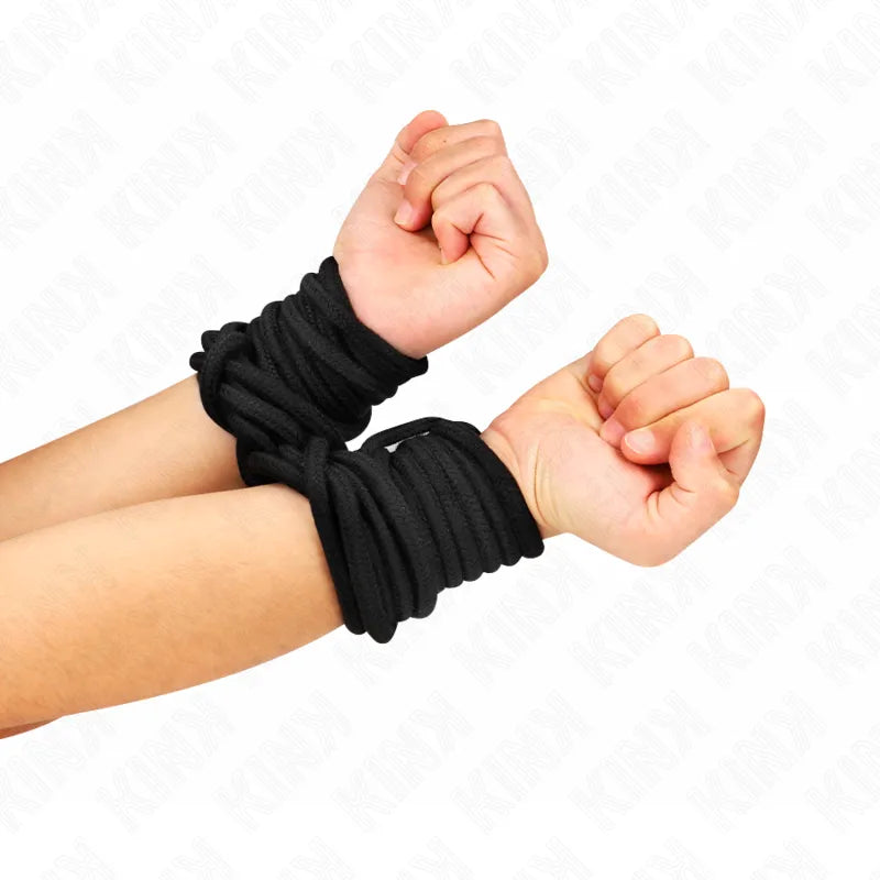 Cordes de bondage en coton noir, nouées autour de poignets, idéales pour débutants, confortables et sécurisées.