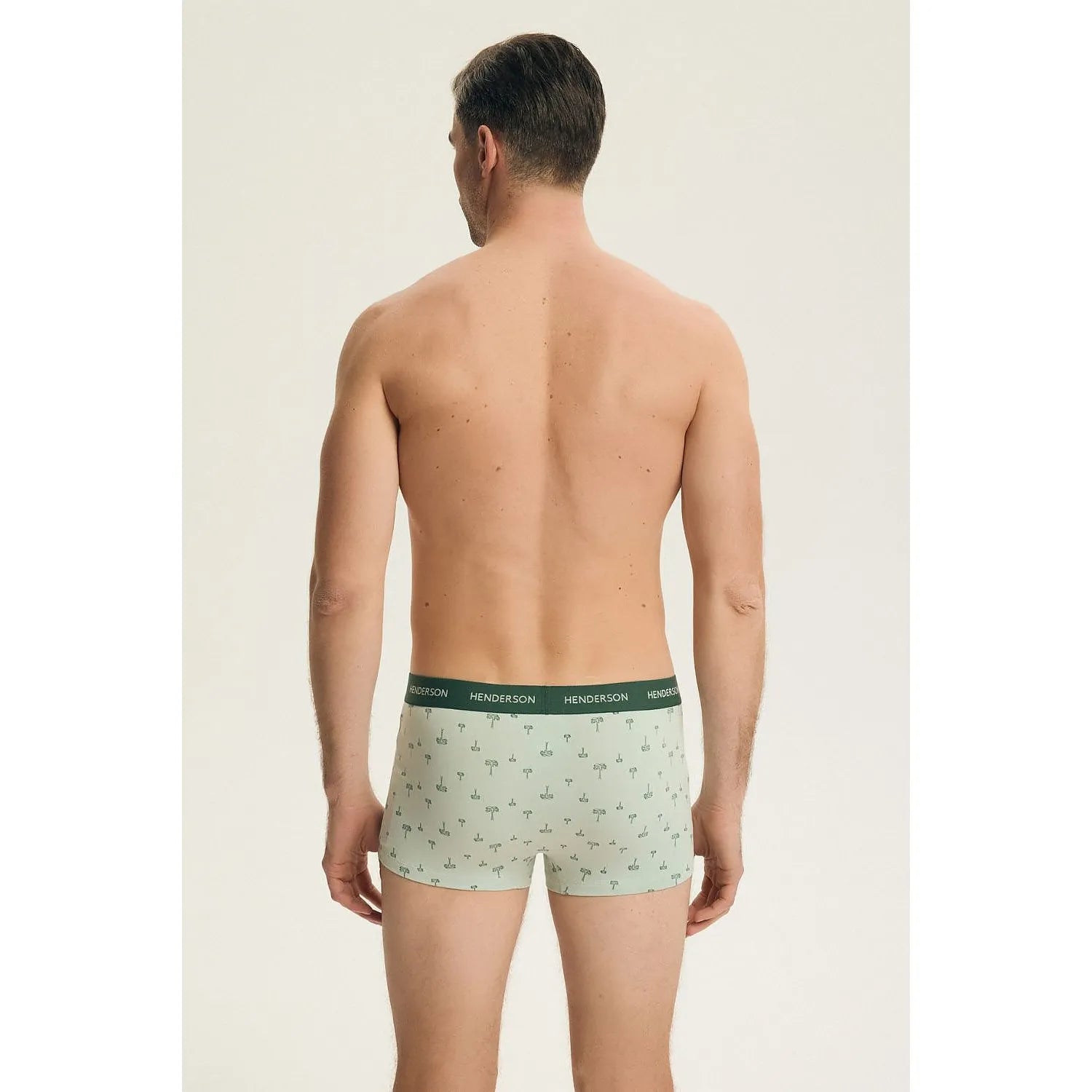 Alt text : Boxer homme Henderson vert motif sportif, ceinture élastique noire, confort moderne coton élasthanne.
