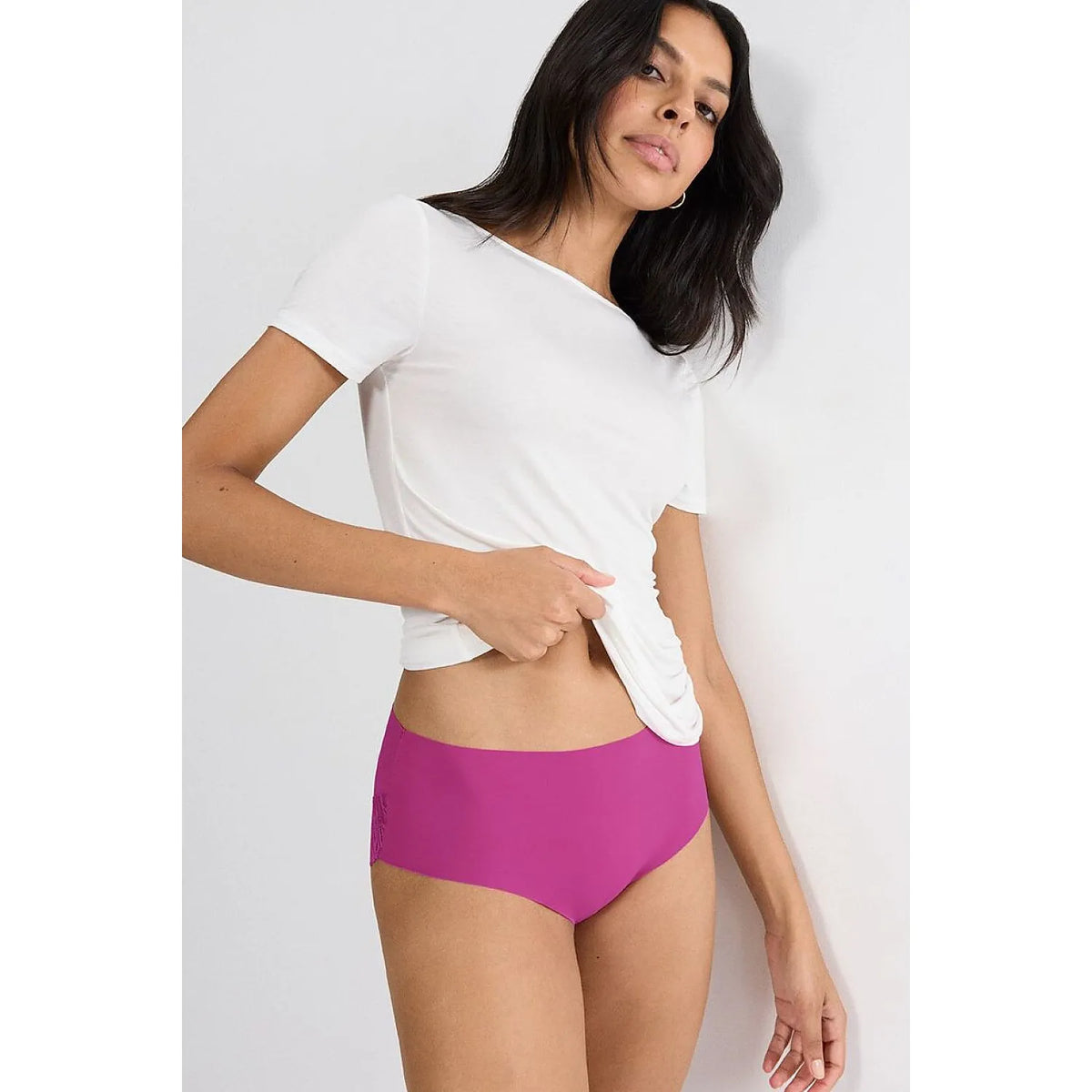 Culotte Triumph modèle 229116 en microfibre rose, coupe maxi, sans couture, offrant confort et invisibilité sous les vêtem...