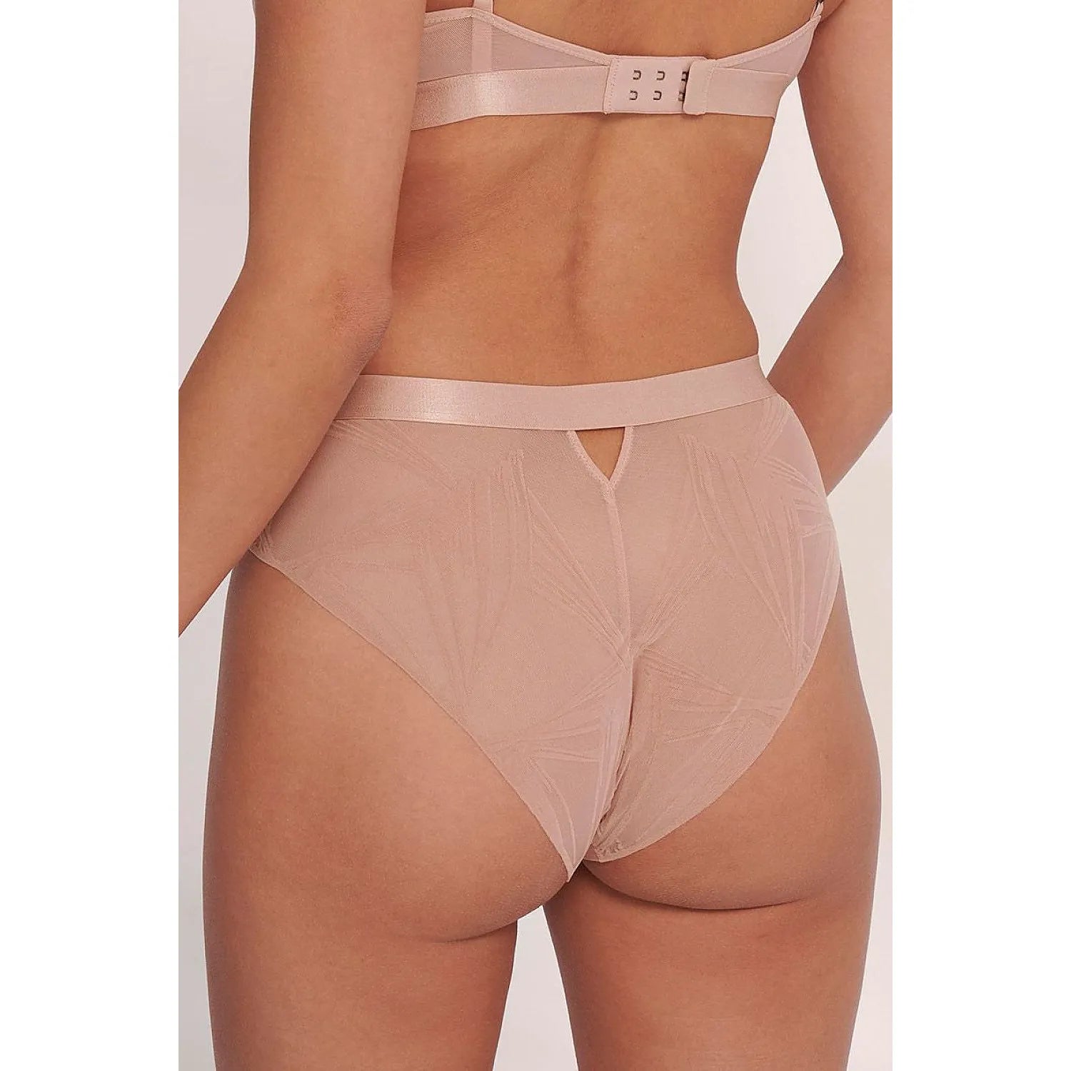 Culottes hautes tulle transparent beige Rosie Woods, design élégant, taille haute, détails sophistiqués, confort optimal.