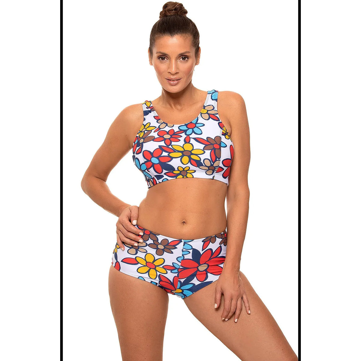 Maillot de bain deux pièces fleuri, soutien-gorge top élastique, culotte haute, tissu Carvico Tessuti, coloré et confortable.