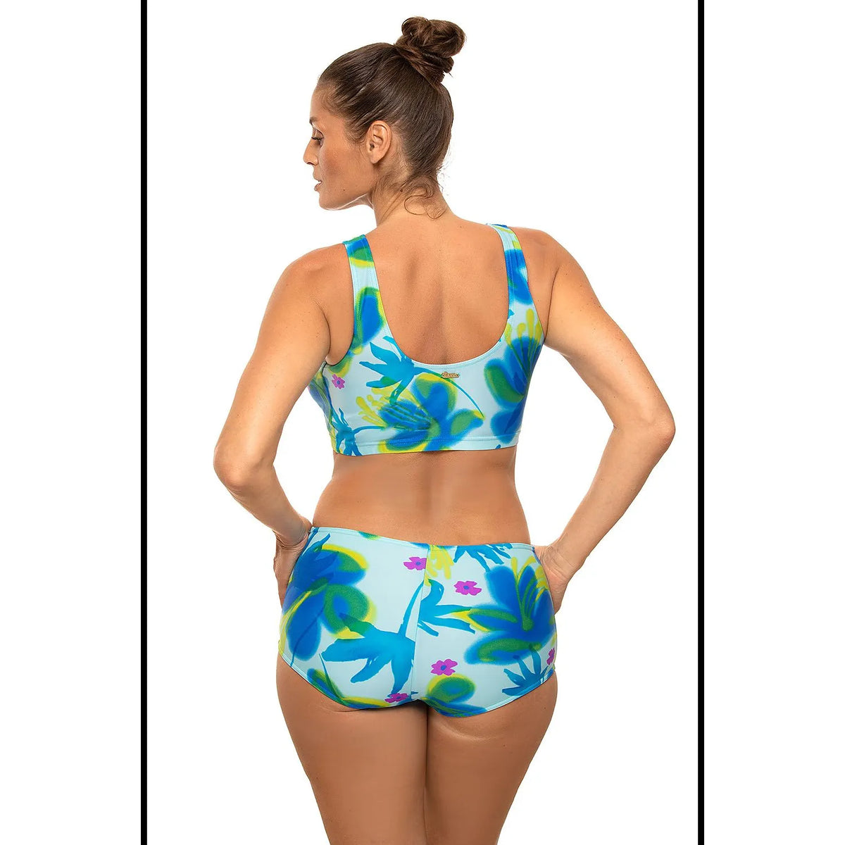 Maillot de bain deux pièces bleu à motifs floraux, soutien-gorge top élastique, culotte haute, tissu Carvico Tessuti.