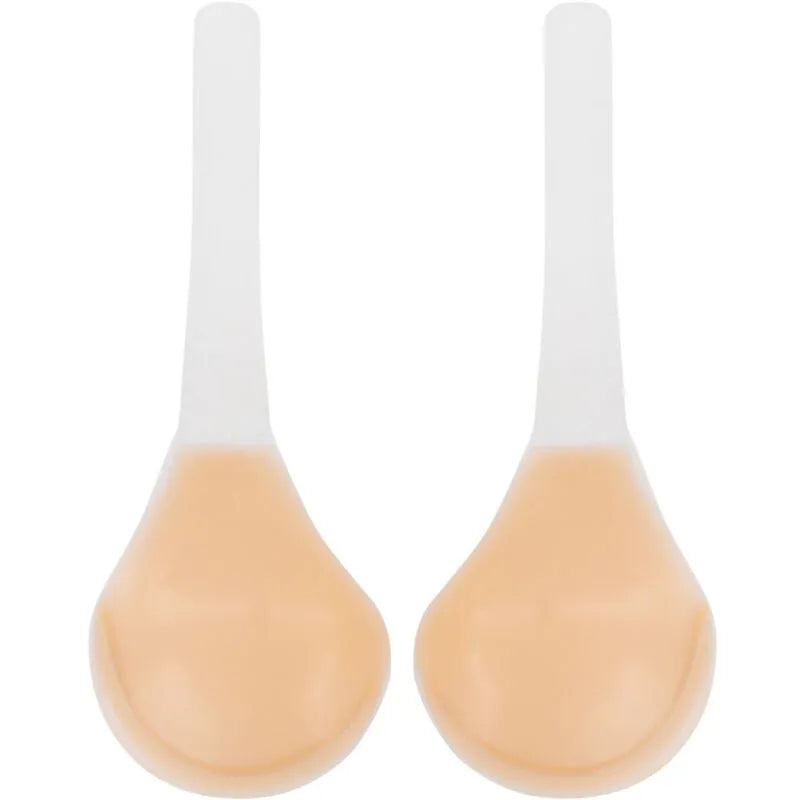 Élévateurs de poitrine en silicone beige avec sangle transparente, offrant soutien et décolleté jusqu'à taille G.