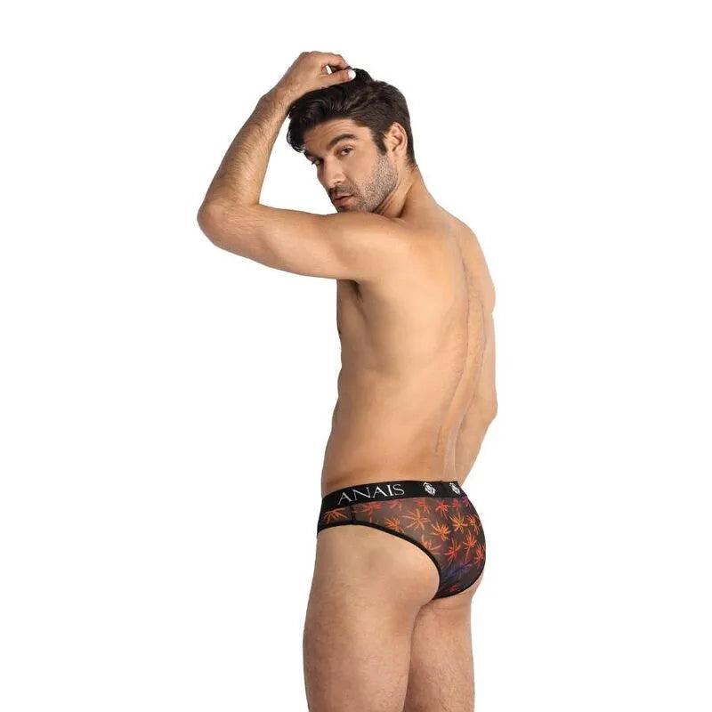 Slip homme Anais noir avec imprimé palmiers colorés, bande élastique à la taille, style sexy et confortable.