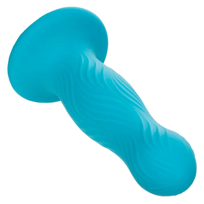 Plug anal bleu Calexotics Wave Rider, texture ondulée, silicone lisse, base à ventouse, design ergonomique.