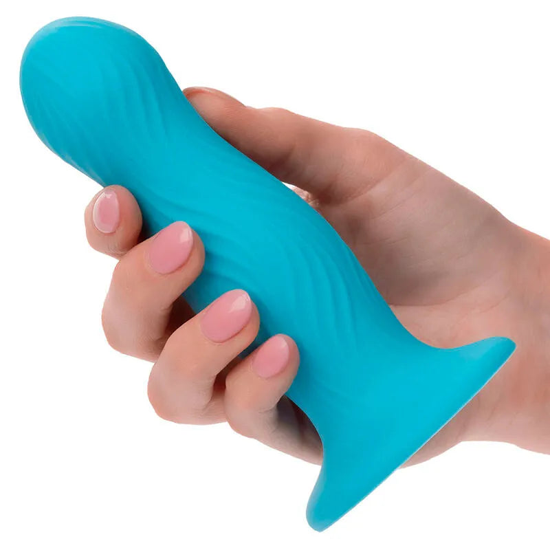 Plug anal bleu en silicone ondulé, base ventouse, imperméable, pour plaisir intense et exploration sécurisée.