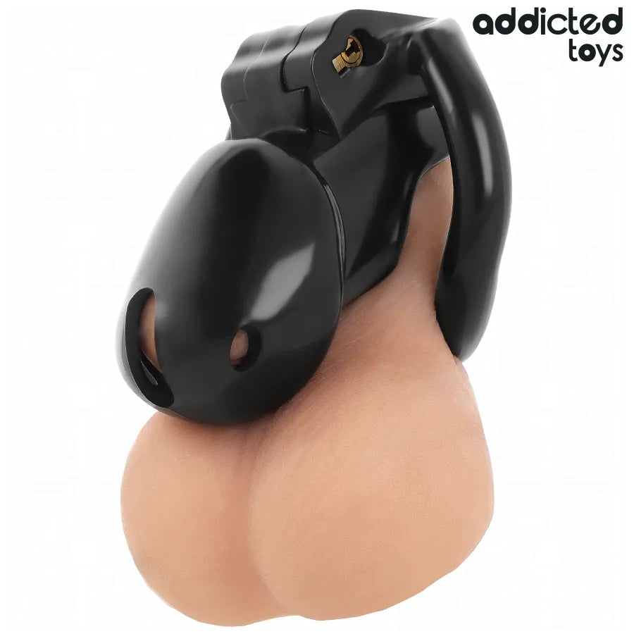 Cage de chasteté noire Addicted Toys, anneaux ajustables, design ergonomique pour domination et sécurité intime.