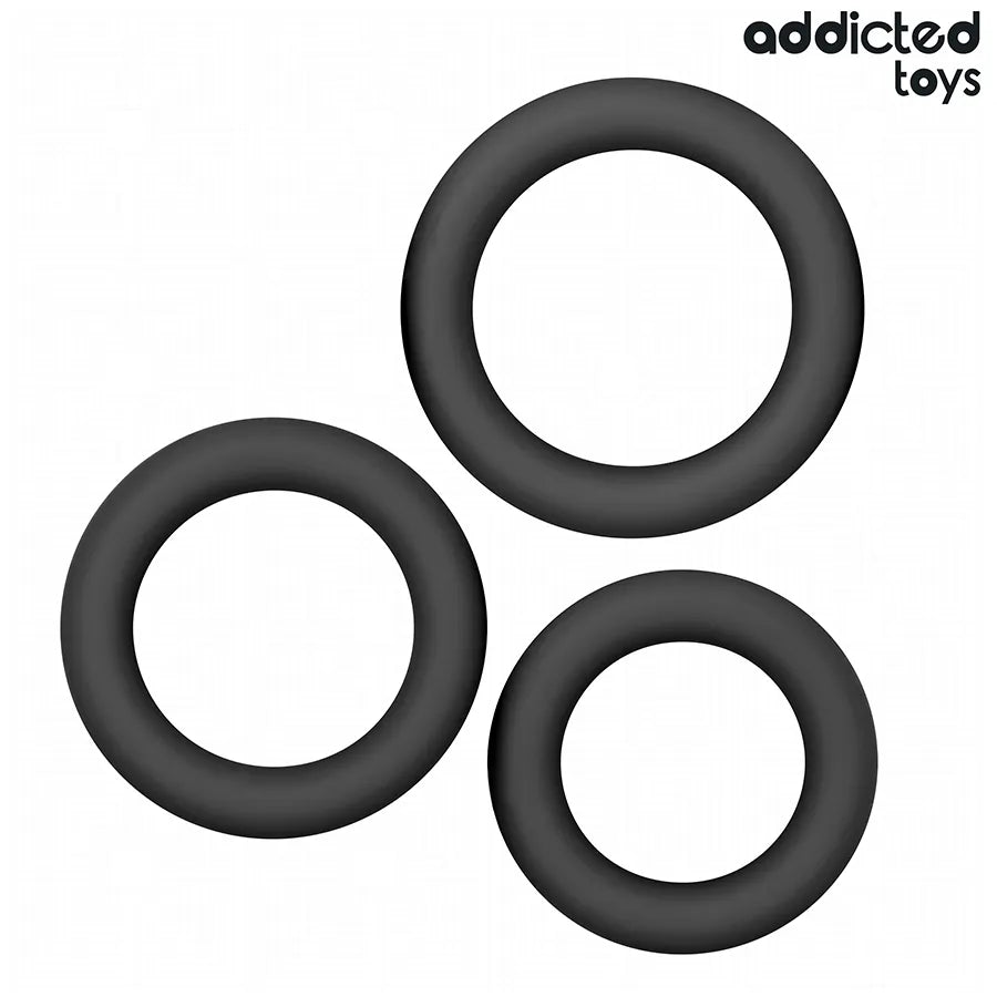 Anneaux péniens en silicone noir Addicted Toys, trois tailles, design circulaire pour confort et performance optimale.
