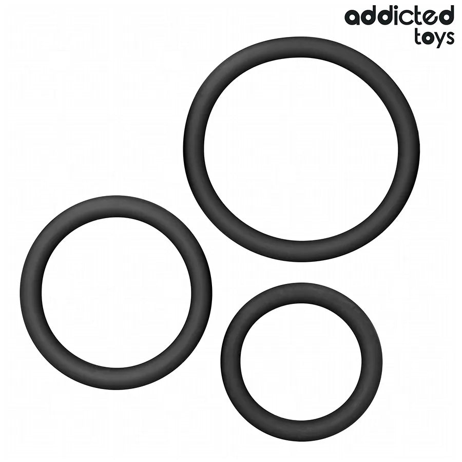 Anneaux péniens en silicone noir Addicted Toys, trois tailles pour stimulation et confort, haute qualité et durabilité.