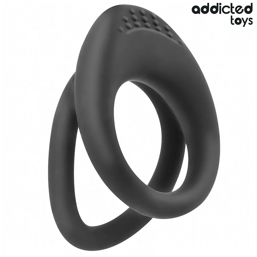 Anneau pénien noir à double texture, design ergonomique, surface texturée pour stimulation accrue, marque Addicted Toys.