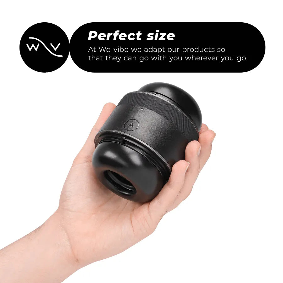 Stroker compact Arcwave Voy noir en silicone, forme cylindrique, tenu dans une main, idéal pour voyages et ajustement pers...