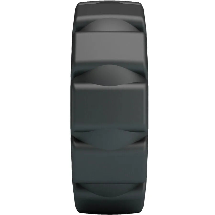 Anneau en silicone noir ondulé, ergonomique et ajustable, pour confort et prolongation des sensations intimes.