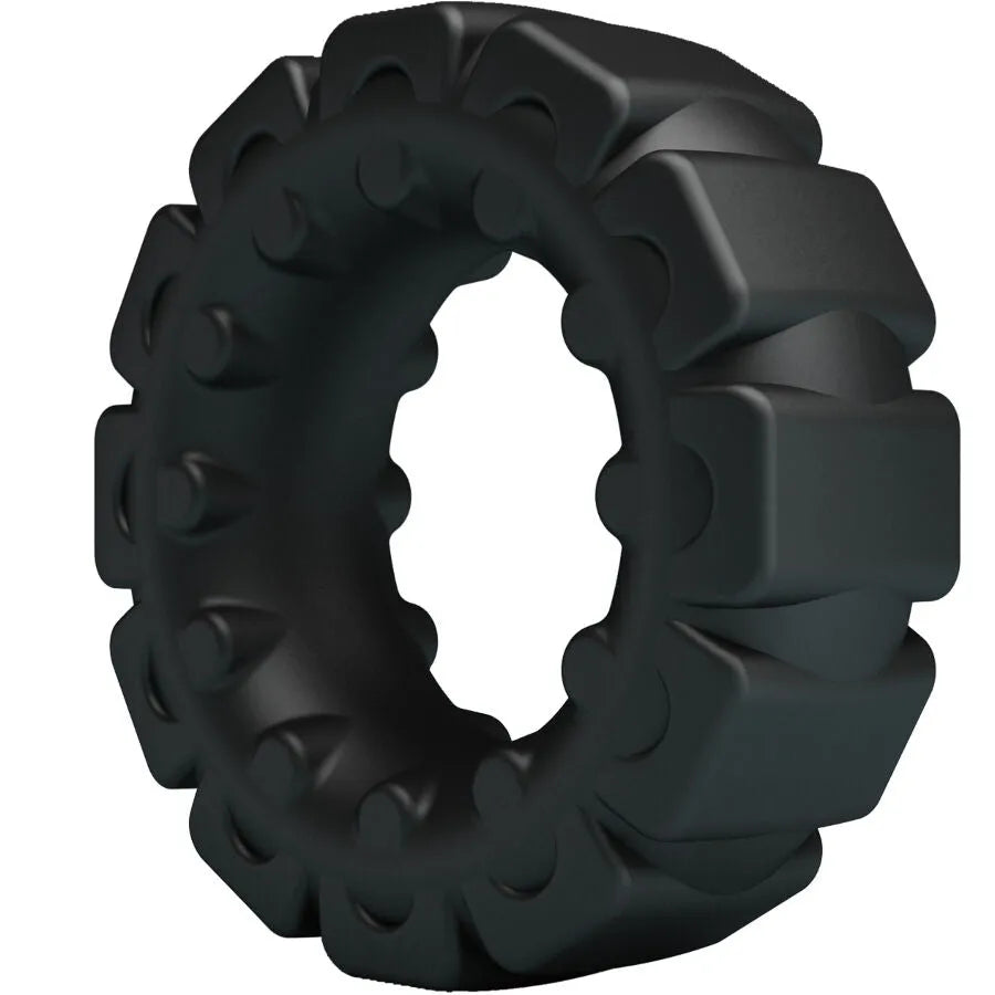 Anneau silicone noir ergonomique ondulé, extensible et ajustable pour confort et prolongation des sensations intimes.