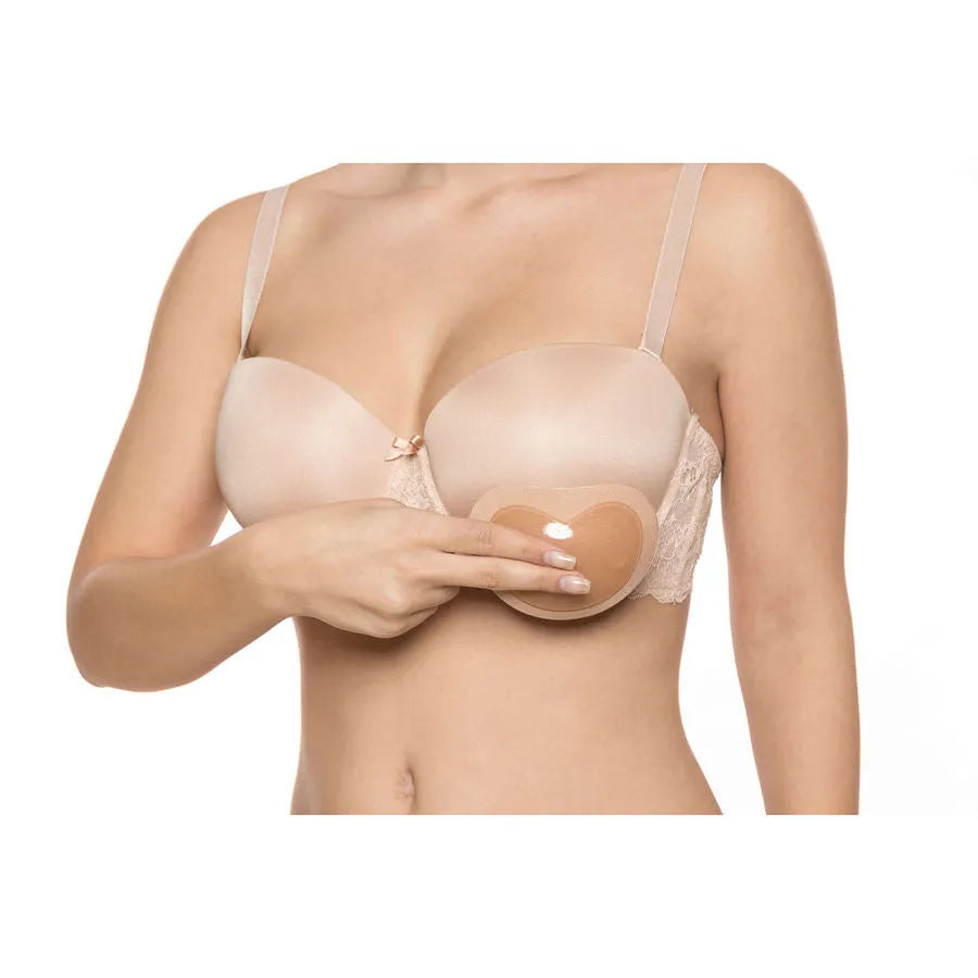 Adhésif soutien-gorge push-up beige, doux et léger, offrant un effet naturel et discret sous les vêtements.