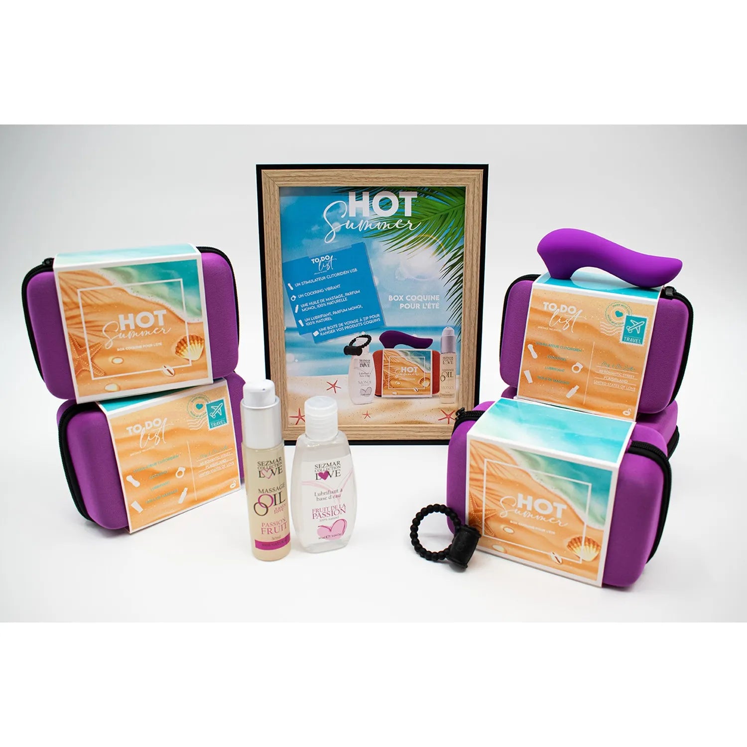 Box Hot Summer avec stimulateur violet, huile de massage fruitée, et accessoires pour moments intimes en couple.