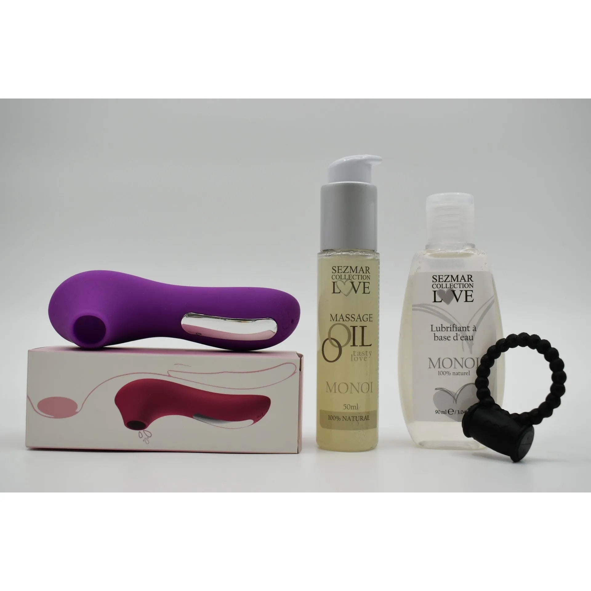 Box couple été avec stimulateur violet, anneau vibrant noir, huile de massage et lubrifiant parfum Monoï.