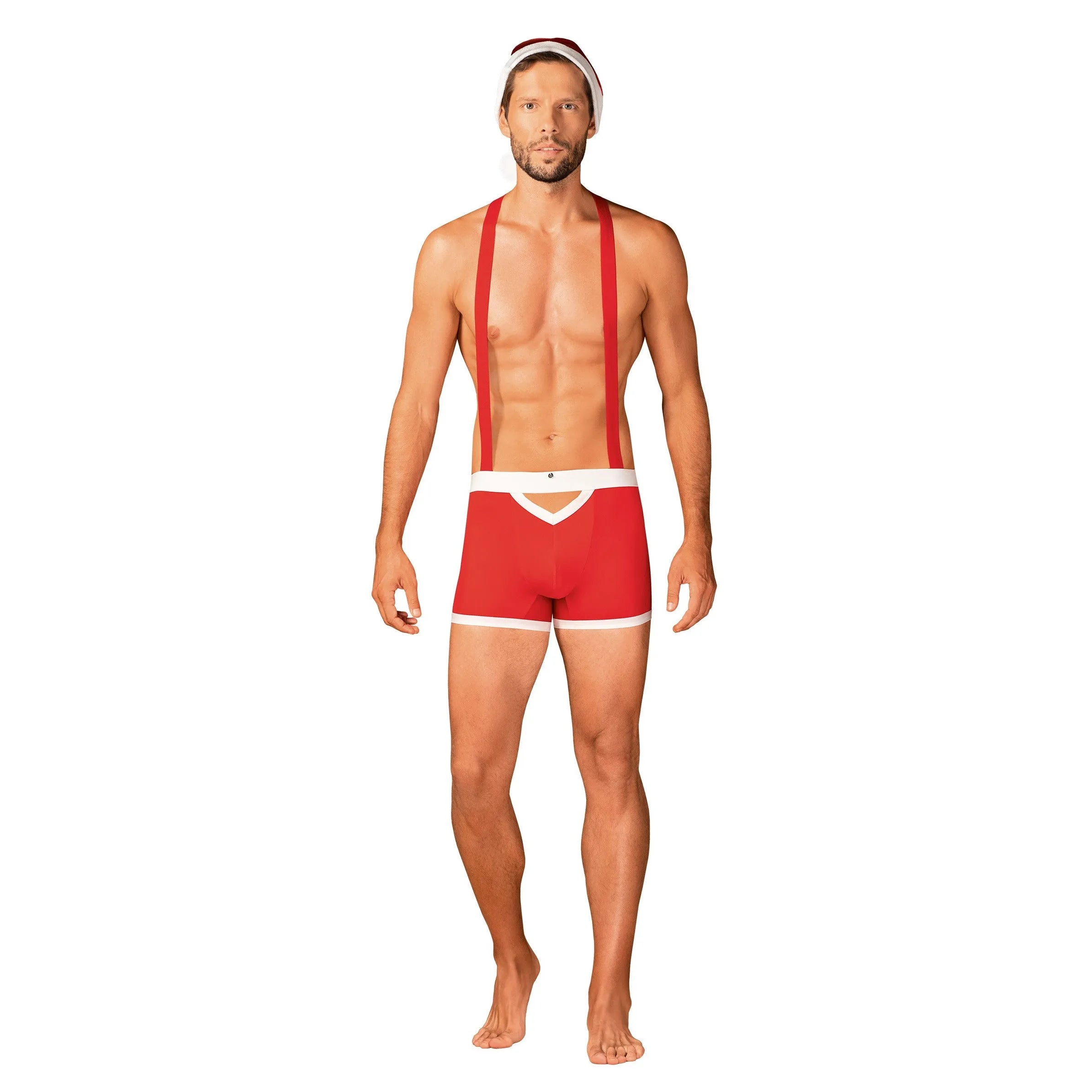Caleçon rouge homme style Père Noël avec bretelles réglables et bonnet pompon, tenue festive élégante et espiègle.