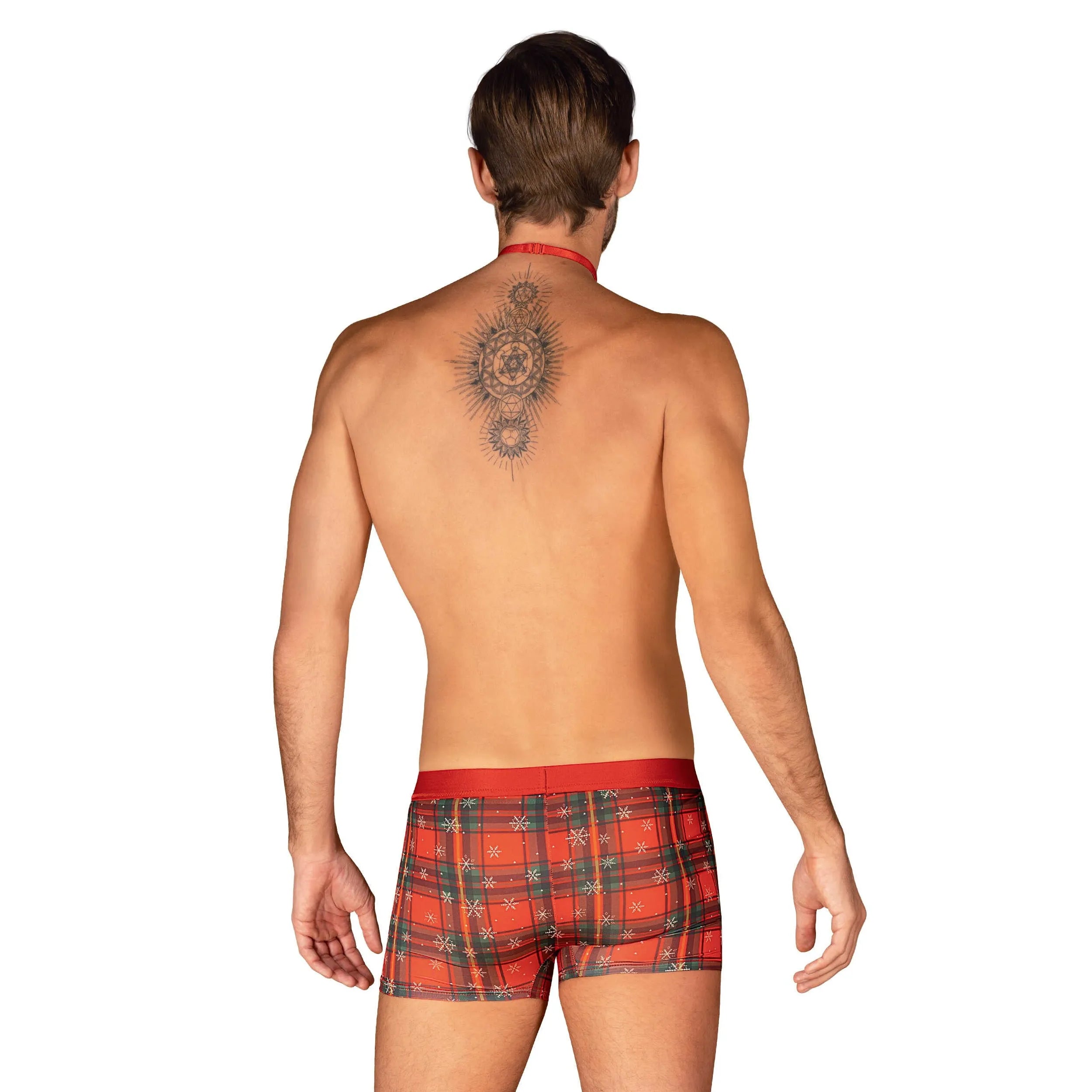 Boxer Noël rouge homme avec nœud papillon, pendentif or, motif festif, élégant et original pour fêtes de fin d'année.