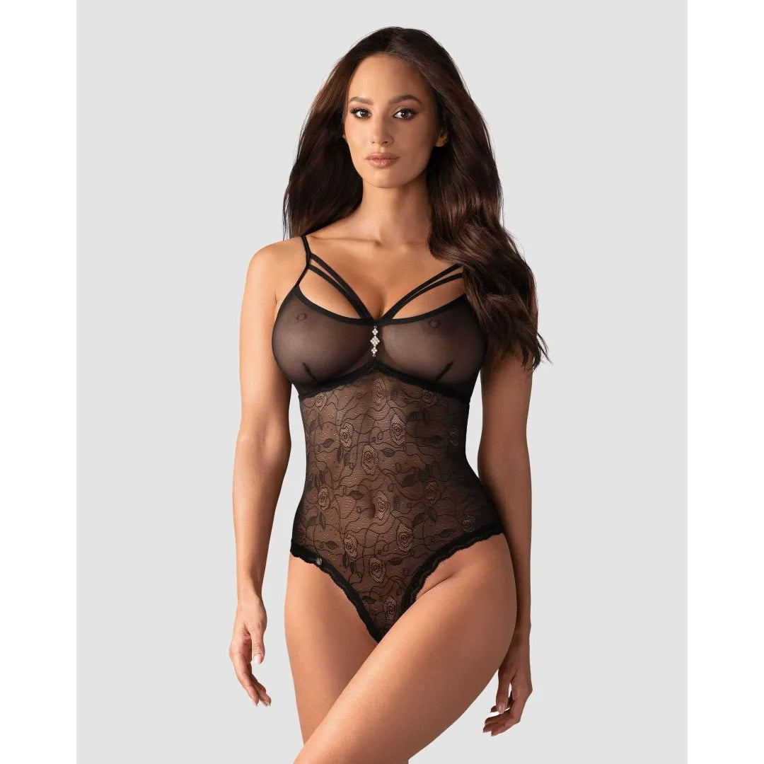 Body femme noir semi-transparent, motifs floraux, bijou central, polyamide élasthanne, élégant et séduisant.