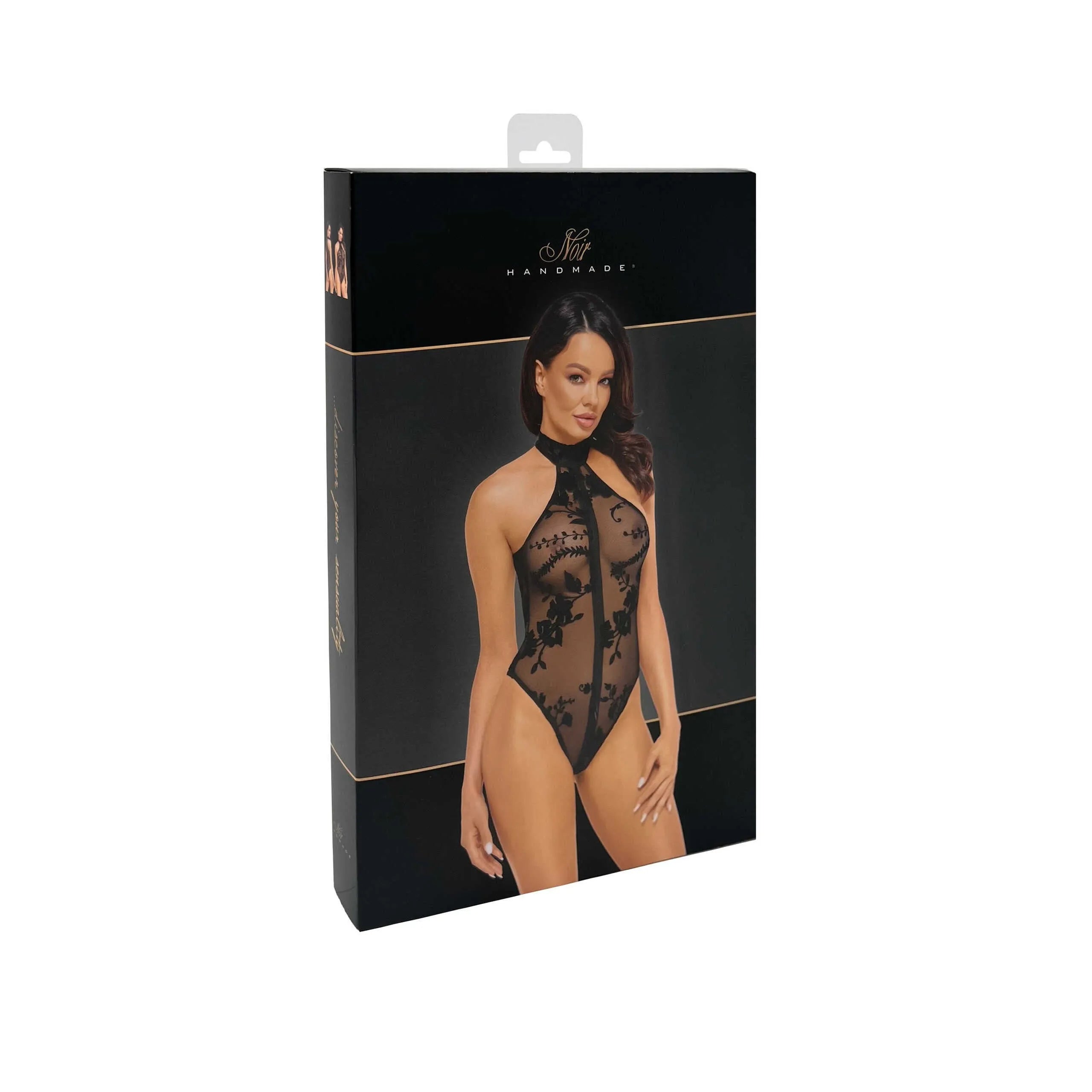 Combinaison licou noire en maille floquée fleurs sauvages, dos nu, fermeture éclair, élégante et sensuelle.