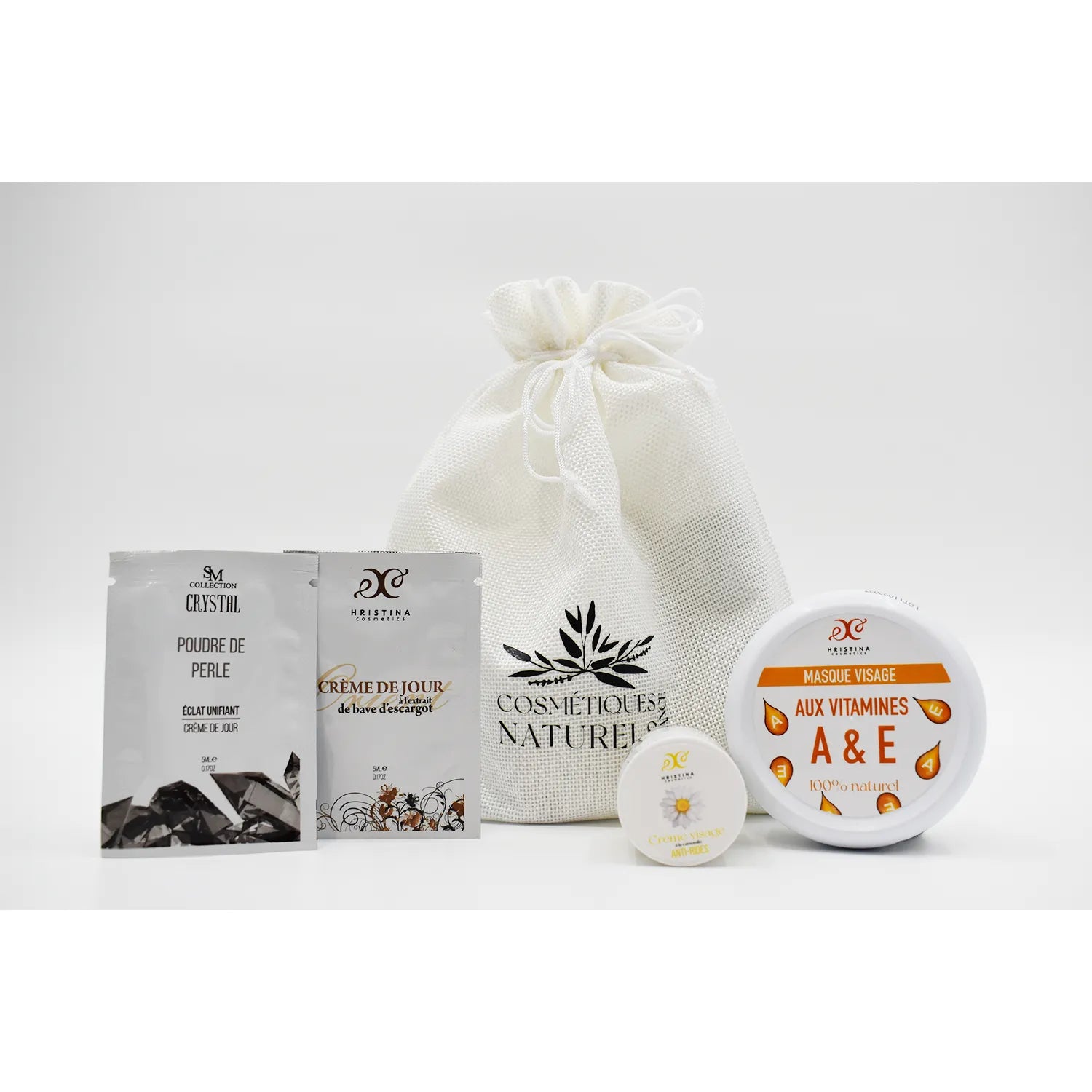 Coffret découverte visage peau mature avec masque vitamines A E, crème anti-rides, et pochette blanche naturelle.