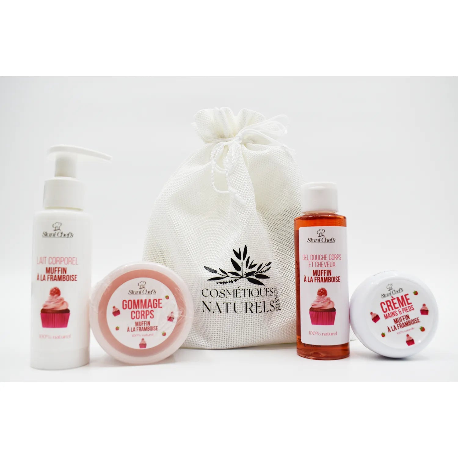Coffret découverte muffin à la framboise avec lait corporel, gommage, gel douche et crème mains, sur fond blanc.