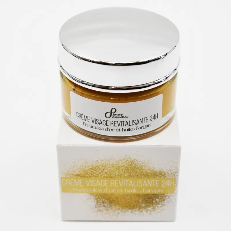 Crème visage revitalisante 24h, pot doré et blanc, particules d'or, huile d'argan, peau mature, hydratation intense.