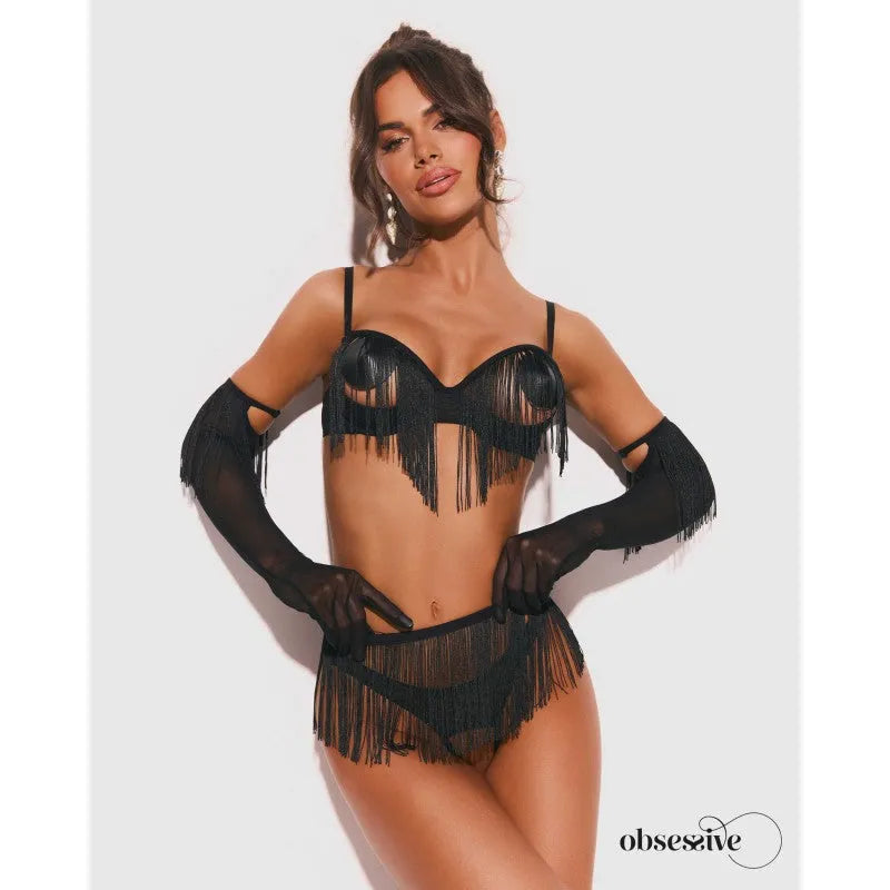 Ensemble lingerie noir avec soutien-gorge et string ouverts, pompons, gants longs, style sensuel et élégant.