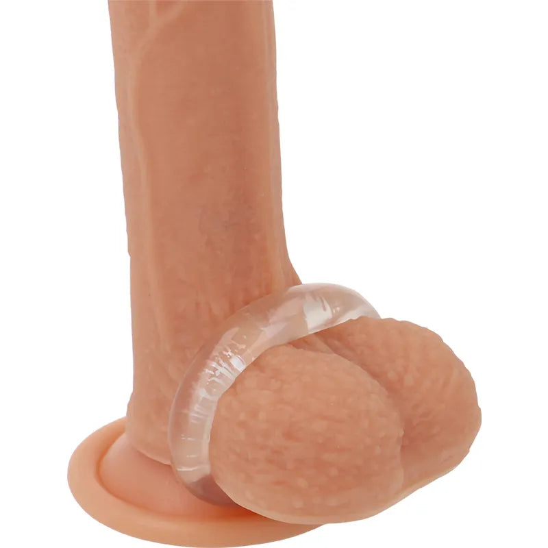 Anneau pénien transparent hypoallergénique TPE sur pénis, améliore performance sexuelle, design ergonomique.