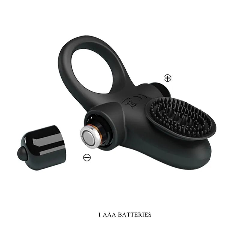 Anneau pénien vibrant en silicone noir avec texture, batterie visible, pour stimulation intense et érection prolongée.