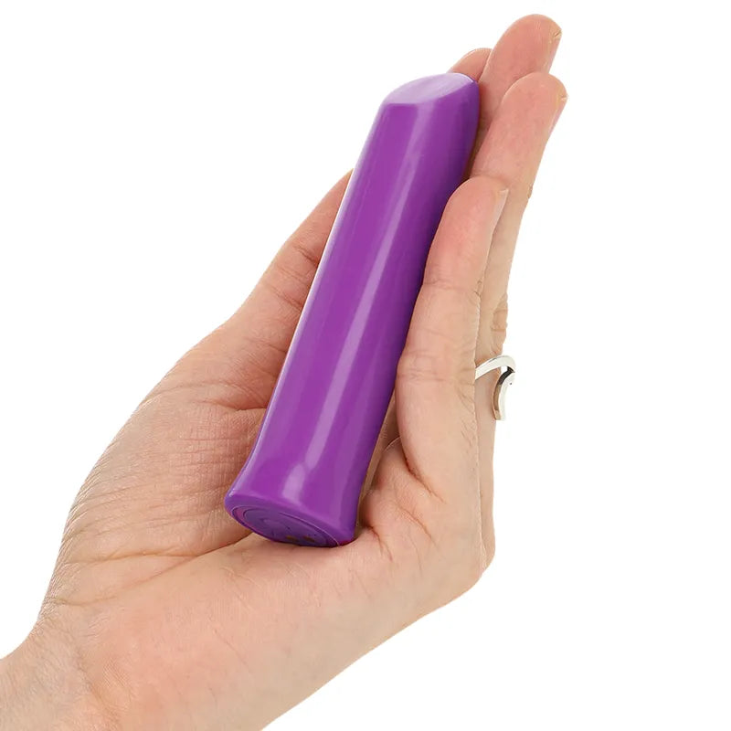 Balle vibrante en silicone violet, étanche, compacte, tenue dans une main, élégante et performante pour stimulation.
