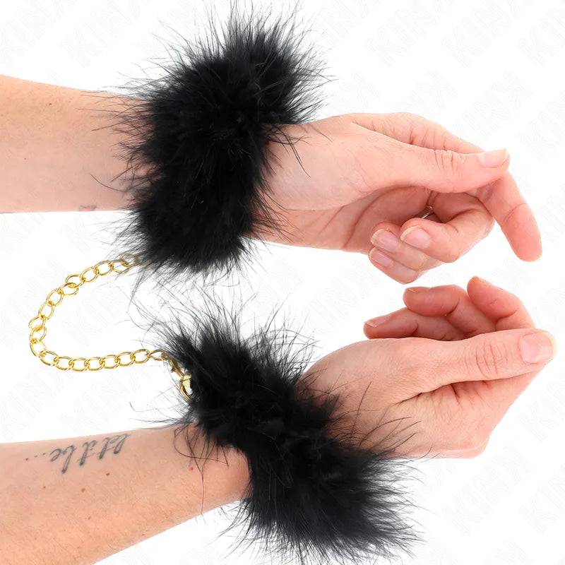 Bracelets BDSM en cuir noir véritable, design élégant et robuste, avec fermoirs métalliques dorés pour confort et durabilité.