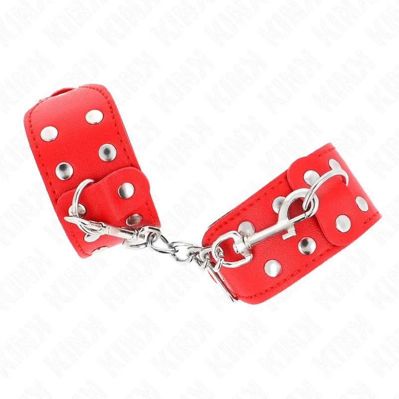Bracelets BDSM rouges en cuir véritable avec rivets métalliques, design élégant et robuste pour pratiques sophistiquées.
