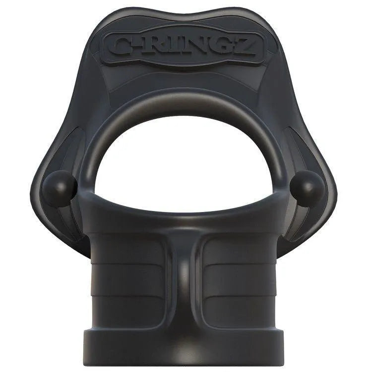 Anneau pénien noir en silicone médical, design ergonomique avec étireur de testicules pour érections durables.