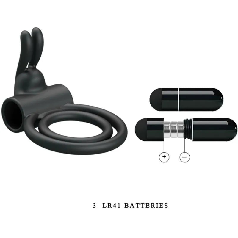 Cockring vibrant noir en silicone avec double anneau et balle vibrante, conçu pour érections durables et stimulation clito...