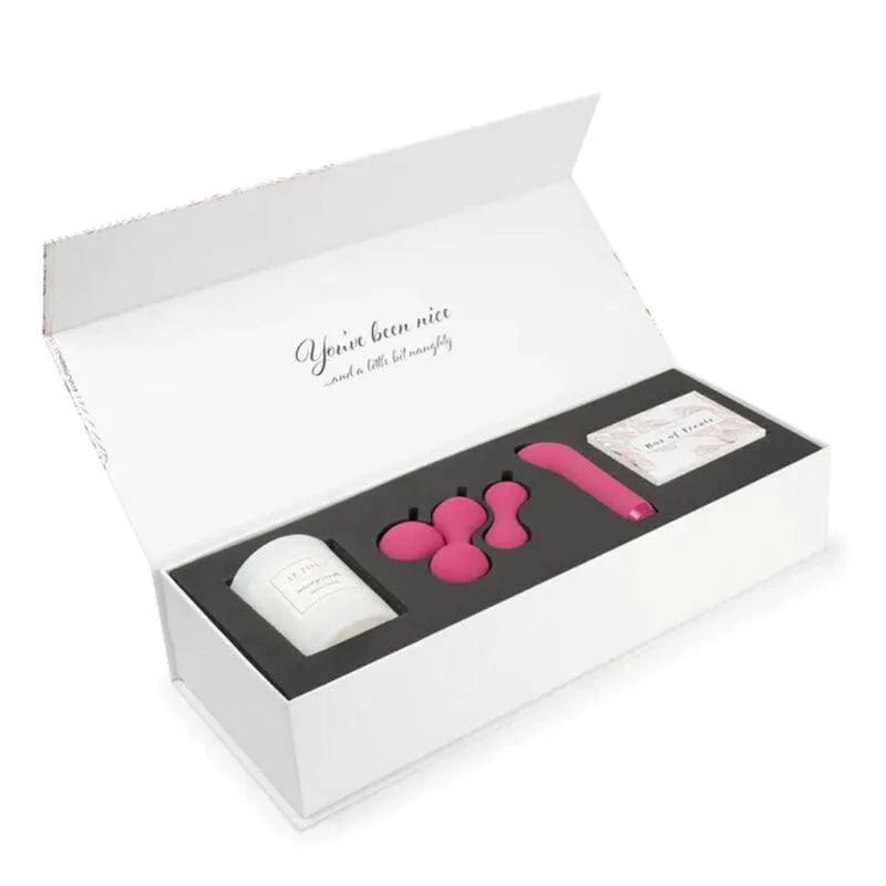 Coffret Je Joue Édition Limitée avec sextoys roses, bougie et accessoires intimes, motif plume or rose, luxe et bien-être.