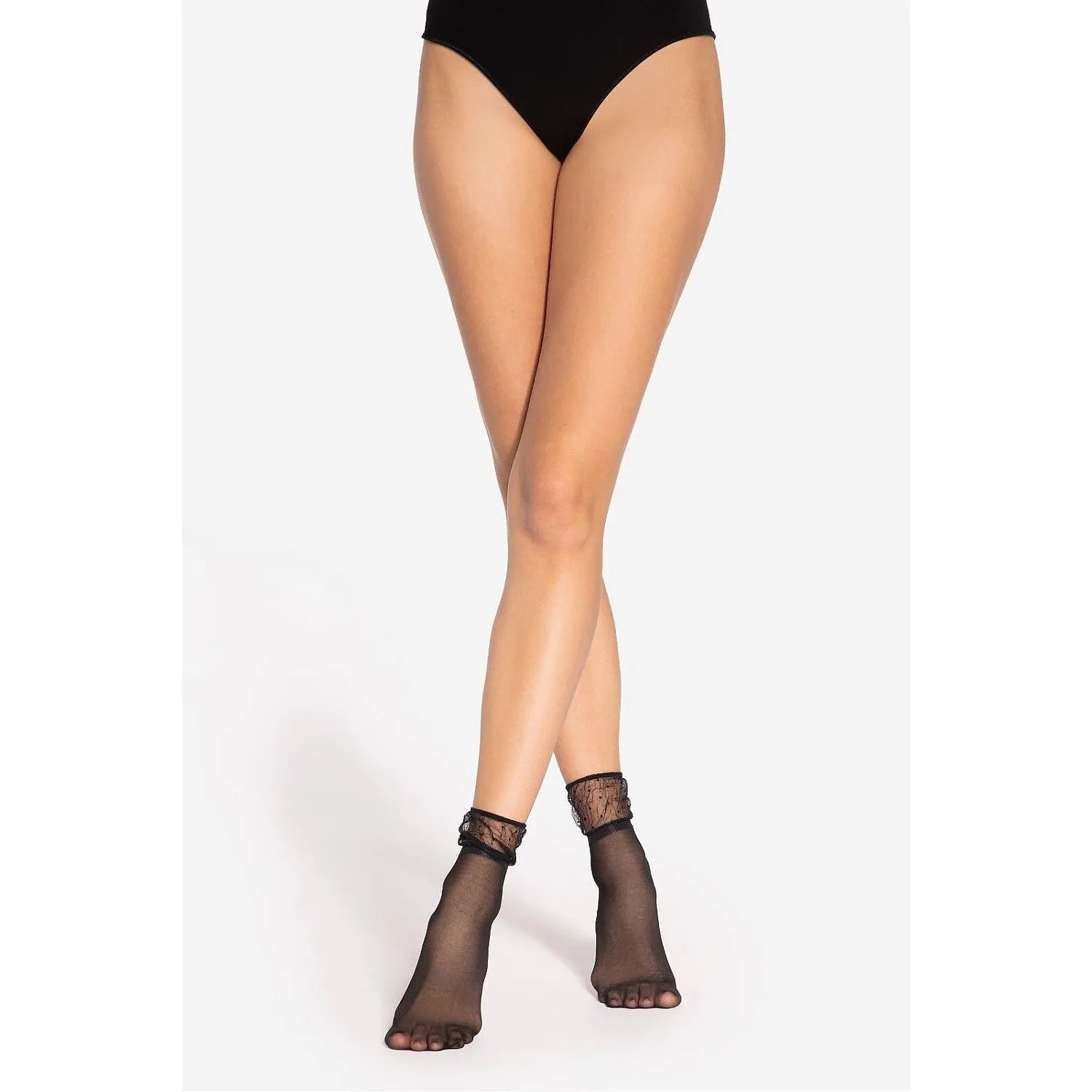 Chaussettes noires 15 DEN Gatta, transparentes, bordure élastique, motif subtil, élégantes pour tenues féminines.