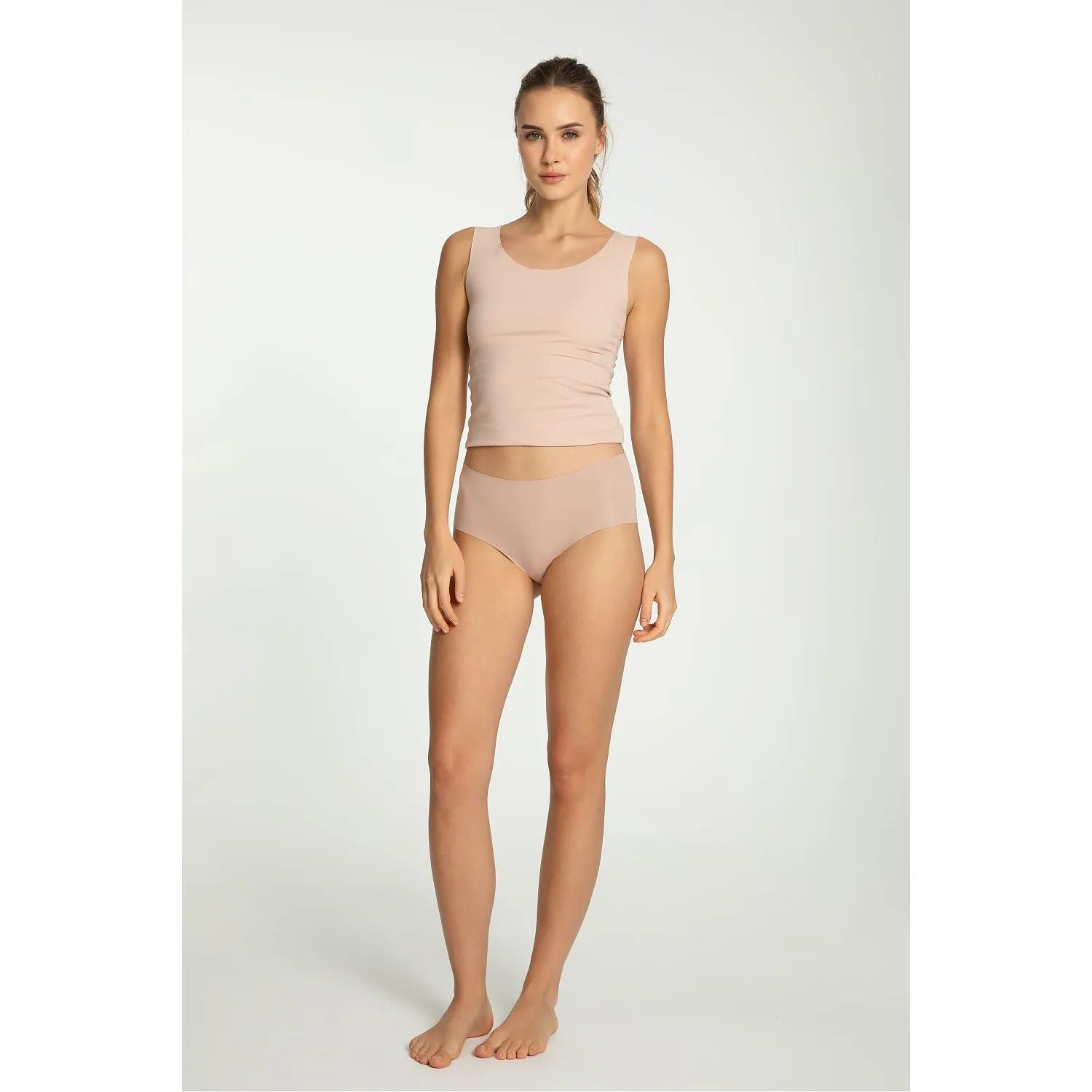 Culotte taille haute beige Julimex 220543, bords coupés laser, ajustement parfait, invisible sous vêtements, confort optimal.