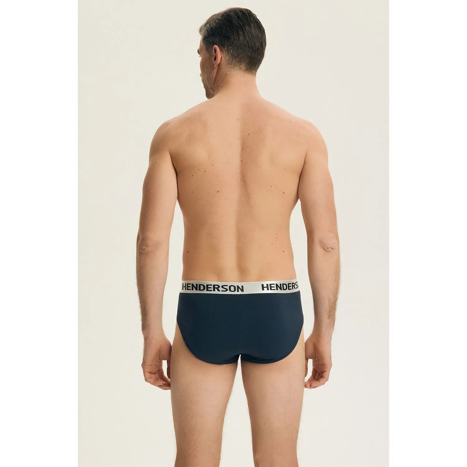 Slips homme bleu marine en coton Henderson, taille élastique blanche avec logo, coupe ajustée pour confort et style classi...